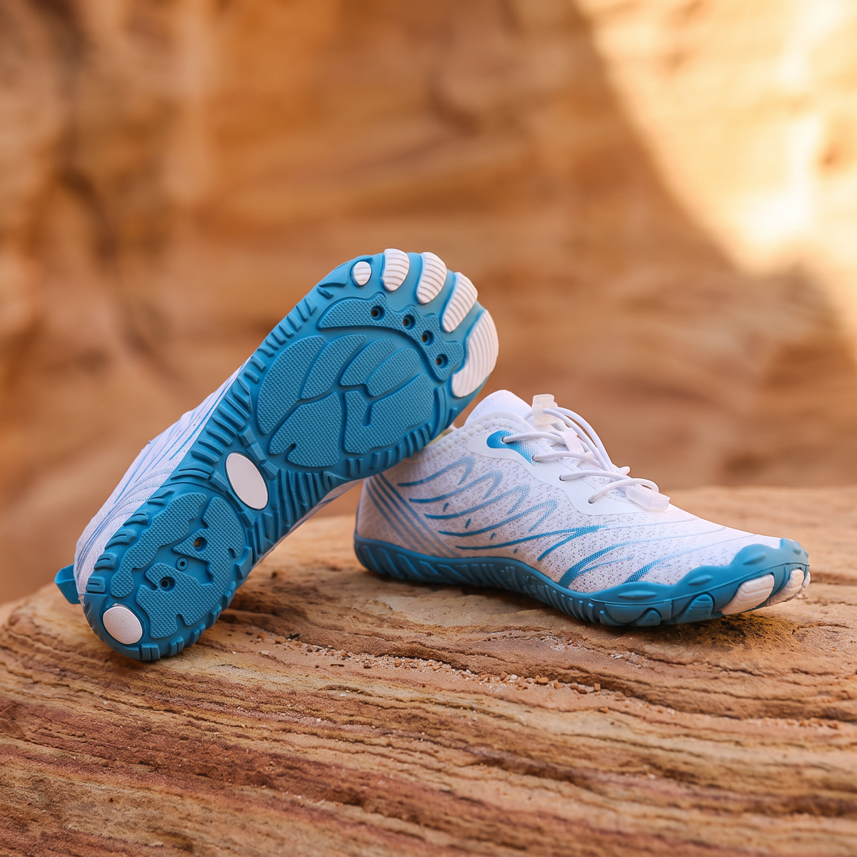 Ocean Blue water trekking shoes on warm sandstone rock