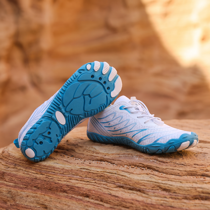 Ocean Blue water trekking shoes on warm sandstone rock